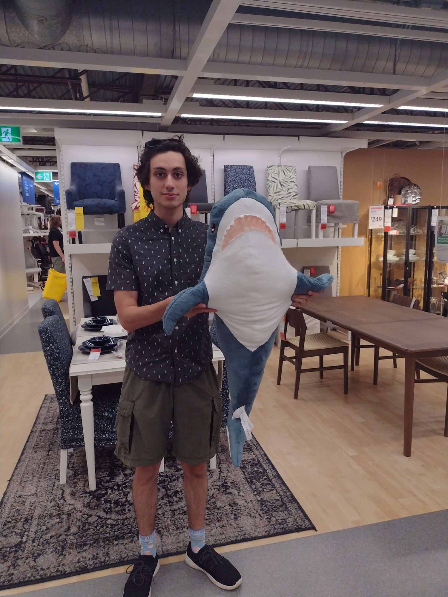 picture of Jailen holding a shark